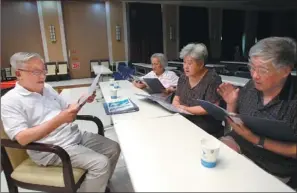  ?? ZHANG WEI/ CHINA DAILY ?? Chen Pingling (left), 82, sings Russian songs with his neighbors at Yanda Internatio­nal Health City in the Yanjiao district of Sanhe, Hebei province.