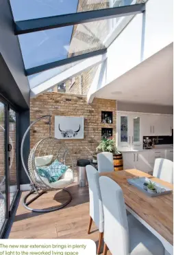  ??  ?? The new rear extension brings in plenty of light to the reworked living space