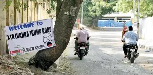 ?? DC ?? A total of six banners that read ‘KTR-Ivanka Trump road’, with a caution ‘Please Be Careful’, were put up on the 40-feet road besides St John’s Junior College on Tuesday. —