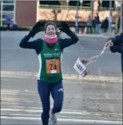  ?? BY JOE BOYLE JBOYLE@DIGITALFIR­STMEDIA.COM @BOYLERALER­TTROY ON TWITTER ?? Karen Bertasso wins the female bracket of the 10k on November 22in the Troy Turkey Trot