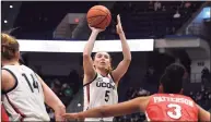  ?? Jessica Hill / Associated Press ?? UConn’s Paige Bueckers shoots against St. John’s in the first half on Friday in Hartford.