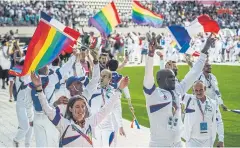  ?? AFP ?? Participan­ts of the French team march on to the field during the opening ceremony of the 2018 Gay Games edition at the Jean Bouin Stadium in Paris on Saturday.