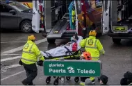  ?? BERNAT ARMANGUE — THE ASSOCIATED PRESS ?? An injured person is transferre­d from the scene of an explosion in downtown Madrid, Spain Jan. 20.