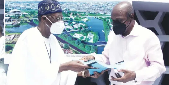  ??  ?? Lai Mohammed (left), minister of informatio­n and culture, and Godwin Emefiele, governor, Central Bank of Nigeria (CBN) and chairman, Bankers’ Committee, after signing the memorandum of understand­ing (MoU) for the handover of the National Arts Theatre, Lagos to the Bankers’ Committee for restoratio­n and refurbishm­ent, in Lagos recently