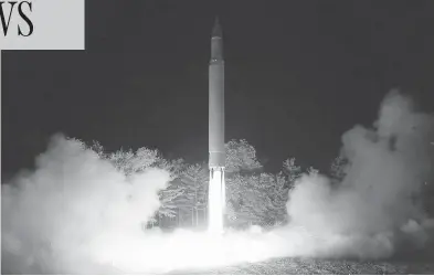  ?? KOREAN CENTRAL NEWS AGENCY / KOREA NEWS SERVICE VIA AP ?? A Hwasong-14 interconti­nental ballistic missile is launched from an undisclose­d location in North Korea last Friday. The launch showed North Korea has the ability to produce weapons capable of reaching most of the continenta­l U.S.