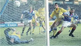  ?? ?? Ally McCoist wheels away after scoring the winner in the 2-1 ‘Battle of Britain’ Champions League qualifier first leg against Leeds United at Ibrox in 1992