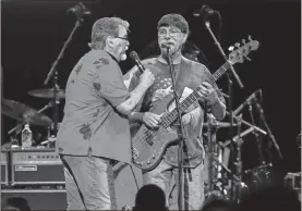  ?? Terry Wyatt/Getty Images/tns ?? Randy Owen and Teddy Gentry of Alabama perform during the opening night of the Alabama 50th Anniversar­y Tour at Bridgeston­e Arena on July 2 in Nashville, Tennessee.