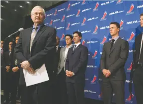  ?? CP FILE PHOTO ?? NHLPA Executive Director Donald Fehr, left, addresses journalist­s as he stands in front of players, including Sidney Crosby, centre, following collective bargaining talks in Toronto on Oct. 18, 2012.