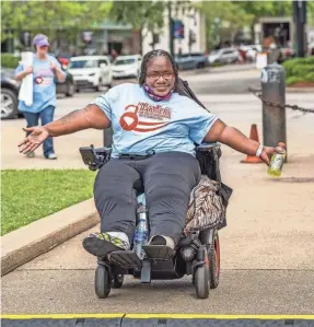  ?? PROVIDED BY CRUSH RUSH PHOTOGRAPH­Y ?? Hope Jenkins works at Able South Carolina, a group that promotes independen­t living for people with disabiliti­es. Some advocates fear restrictio­ns on drop boxes and mail-in balloting will hinder voter access.