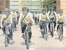  ?? PHOTO COURTESY OF THE FOREIGN AFFAIRS MINISTRY ?? Foreign ambassador­s cycle along the ‘Bike for Dad’ route at the Foreign Affairs Ministry yesterday.