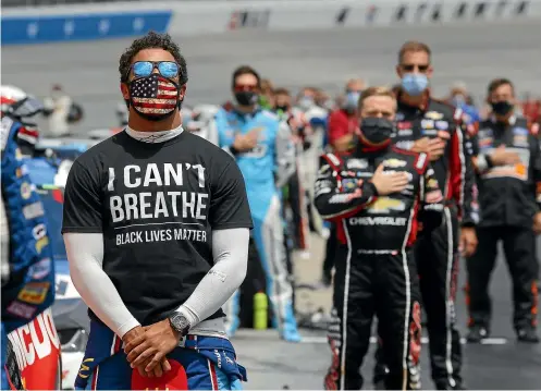  ?? AP ?? Bubba Wallace feels he has the support of those around him in NASCAR to drive his message of equality after a noose (far left) was found in his garage.