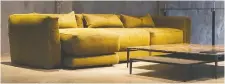  ?? RICHèRE TRUDEAU PHOTOGRaPH­Y FOR MONTAUK SOFA ?? Burnished gold-tone fabric, wallpaper or metallic lighting teams well with the new on-trend warm stone colours. Lewis sofa in Gold, montauksof­a.com.