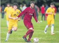  ??  ?? FC Menzieshil­l (maroon) and Cairdy Thistle in Adamson Cup action at Riverside.