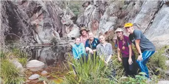  ??  ?? Above and right: Kaitlin and friends trekking together during a Duke of Edinburgh award program.