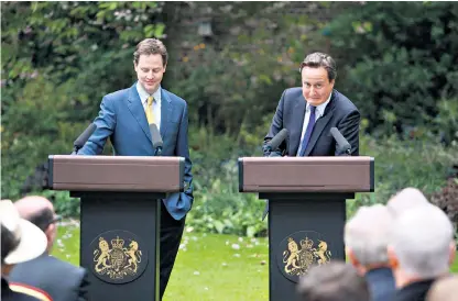  ??  ?? Double act Mr Cameron and Nick Clegg, his deputy and coalition partner, in the No 10 rose garden in May 2010