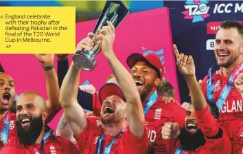  ?? AP ?? England celebrate with their trophy after defeating Pakistan in the final of the T20 World Cup in Melbourne.