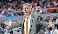  ?? BRYNN ANDERSON THE ASSOCIATED PRESS ?? Auburn head coach Bruce Pearl reacts during the first half of an NCAA basketball game against South Carolina earlier this month.