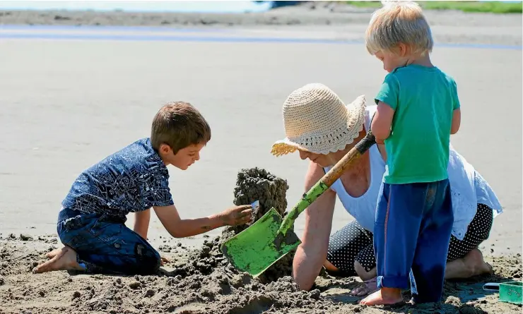  ?? PHOTO: ISTOCK ?? As the first holiday since the dreary depths of winter, it’s the perfect time to jump-start the good vibes of the summer holiday season and head to the beach to build sandcastle­s.