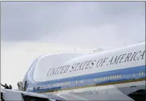  ?? PATRICK SEMANSKY — THE ASSOCIATED PRESS ?? President Joe Biden waves as he and first lady Jill Biden board Air Force One at Ellington Field Joint Reserve Base in Houston, Friday, Feb. 26, 2021. The Bidens are en route to Washington.