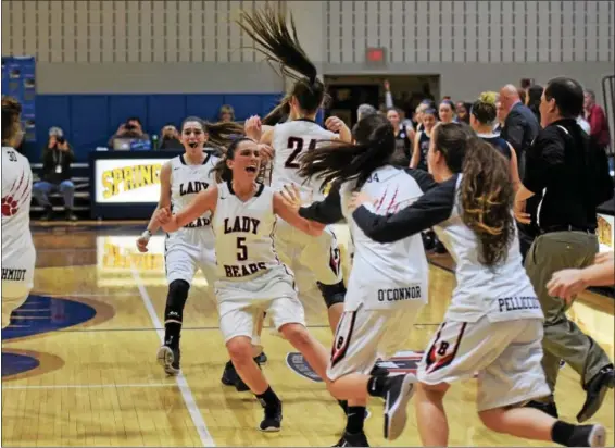  ?? AUSTIN HERTZOG - DIGITAL FIRST MEDIA ?? The Boyertown bench mobs Alli Marcus (5) and Tori Boalton (also facing) after the Bears defeated Cardinal O’Hara in the PIAA Class 6A semifinals Monday at Spring-Ford.