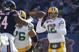  ?? NAM Y. HUH — THE ASSOCIATED PRESS FILE ?? The Green Bay Packers’ Aaron Rodgers, a Chico native, throws during the first half against the Chicago Bears on Sunday, Dec. 4, in Chicago.