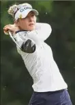  ?? Gregory Shamus / Getty Images ?? Nelly Korda watches her drive on the 17th hole during Saturday’s third round of the Meijer LPGA Classic.