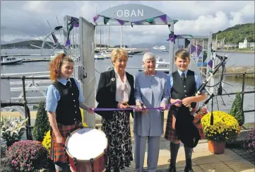  ?? 17_t36pontoon­s01 ?? Marley Squire, Cathy MacGregor, Mairi Malloy and Innes Munro all helped to cut the ribbon as the pontoons are officially opened.