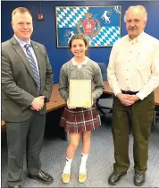  ?? Photo submitted ?? State champion swimmer, Maddie Lanzel, is shown accepting a proclamati­on from City Manager Joe Fleming, on the left and Mayor Lyle Garner, on the right.