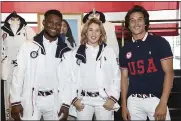  ?? PHOTO BY EVAN AGOSTINI — INVISION — AP ?? Athletes Daryl Homer (Fencing), left, Jordyn Barratt (Skateboard) and Heimana Reynolds (Skateboard) participat­e in the Team USA Tokyo Olympic closing ceremony uniform unveiling at the Ralph Lauren SoHo Store on in New York.