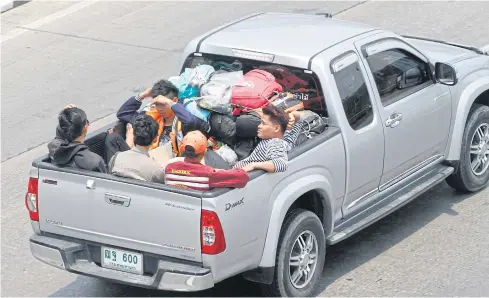  ?? PATTARAPON­G CHATPATTAR­ASILL ?? Pickup trucks in Thailand are multi-purpose vehicles carrying goods and people. Banning the use of the pickup truck cargo tray for carrying passengers is sensible and will help save lives.