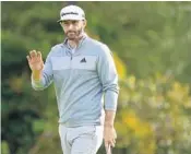  ?? HARRY HOW/GETTY IMAGES ?? Dustin Johnson coasted home to a 71 and a five-shot victory at the Genesis Open at Riviera Country Club.