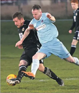  ?? Photo: Iain Ferguson, the Write Image. ?? Fort William midfielder Michael Gillespie shields the ball from Keith’s Michael Ralton.