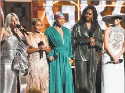  ?? Matt Sayles / Associated Press ?? Lady Gaga, from left, Jada Pinkett Smith, Alicia Keys, Michelle Obama and Jennifer Lopez speak at the 61st annual Grammy Awards on Sunday, Feb. 10, 2019, in Los Angeles.