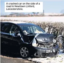  ??  ?? A crashed car on the side of a road in Newtown Linford, Leicesters­hire.