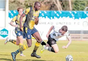  ??  ?? Josh Kelly is challenged by Moussa Diarra. Photo: George Tewkesbury.