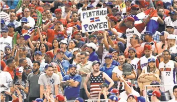  ?? LOGAN BOWLES, USA TODAY SPORTS ?? A raucous crowd showed up for Saturday’s USA- Dominican Republic game at Marlins Park in Miami. The defending WBC champion Dominicans rallied to win 7- 5.