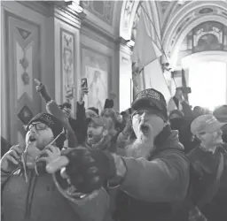  ?? ROBERTO SCHMIDT/AFP VIA GETTY IMAGES ?? A pro-Trump mob storms the U.S. Capitol on Wednesday.