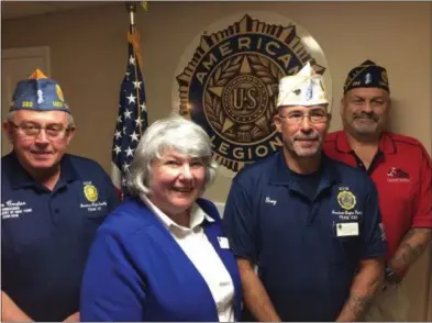  ?? PAUL POST — PPOST@DIGITALFIR­STMEDIA.COM ?? New York State American Legion officials visited Saratoga County on Tuesday. From left to right are Sons of The American Legion Commander Jim Coates, Auxiliary President Marie Mock, American Legion Commander Gary Schacher and Legion Riders Director Bob Wallace.