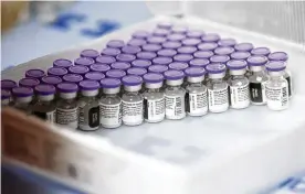  ?? KEVIN MOHATT / THE NEW YORK TIMES ?? Financial and bureaucrat­ic barriers in the United States mean that the next generation of COVID vaccines may well be designed here, but used elsewhere. China, India, Russia and Iran have all approved vaccines delivered through the nose or the mouth, which is seen as the way most likely to reduce spread of the virus.