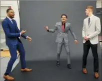  ?? AP PHOTO — JOHN BAZEMORE ?? Atlanta Hawks NBA basketball team first-round draft picks from left; Omari Spellman, Trae Young and Kevin Huerter laugh after posing for photos following a news conference Monday in Atlanta.