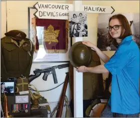  ?? WAYNE EMDE/Special to The Daily Courier ?? Former Army Cadet Andrew Cusveller arranges one of the displays that were part of the pop-up Cadet Museum in Downtown Vernon last summer as he and the volunteers prepare to re-open the museum on the grounds of the Vernon Military Camp this summer.