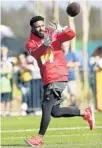  ?? DOUG BENC/AP ?? Dolphins wide receiver Jarvis Landry, who is eligible to become a free agent in March, catches a pass during Pro Bowl practice.