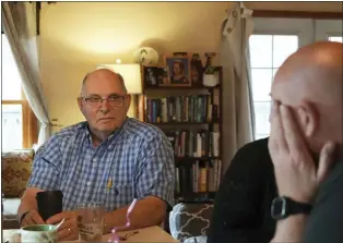  ?? SHELBY LUM - THE ASSOCIATED PRESS ?? Doug Whitney, left, and his son, Brian, in Manson, Wash., on Nov. 5. Doug inherited the same gene mutation that gave Alzheimer’s disease to his mother, brother and generation­s of other relatives by the age of 50.