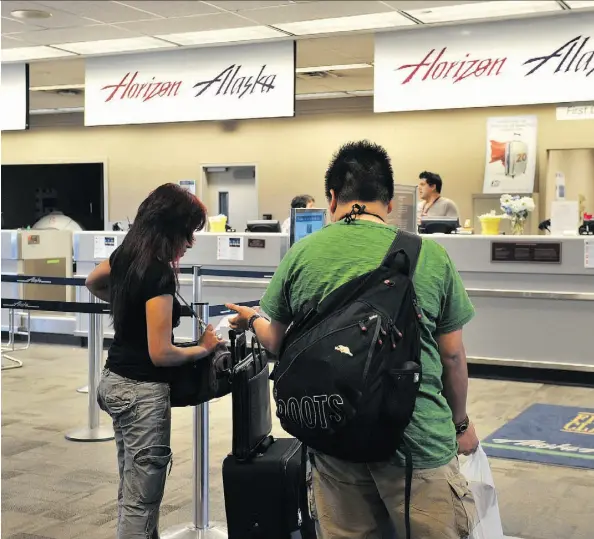  ?? JENELLE SCHNEIDER/POSTMEDIA NEWS ?? B.C. travellers looking for a cheaper option when flying often head to the Bellingham Internatio­nal Airport just south of the U.S. border from Vancouver, but some U.S. airports are reporting that they are seeing fewer Canadian passengers due to a...