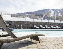  ??  ?? Guests can swim and soak in the outdoor pool and hot tub in an irresistib­le getaway at the Burke Mountain Hotel and Conference Center in Burke, Vt.