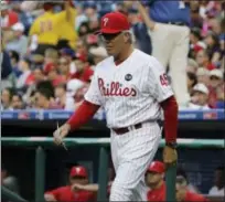  ?? MATT SLOCUM - THE ASSOCIATED PRESS ?? With manager Pete Mackanin looking as though he’ll have a more stable lineup in 2017, the Phillies begin their season today in Cincinnati against the Reds.