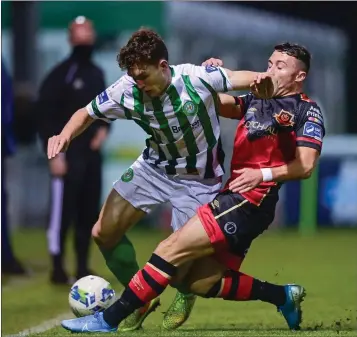  ??  ?? Luka Lovic of Bray Wanderers is tackled by Chris Lyons last Friday night.