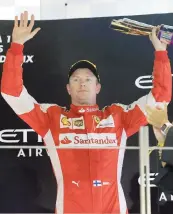  ?? LAPRESSE ?? La proverbial­e euforia di Kimi Raikkonen sul podio