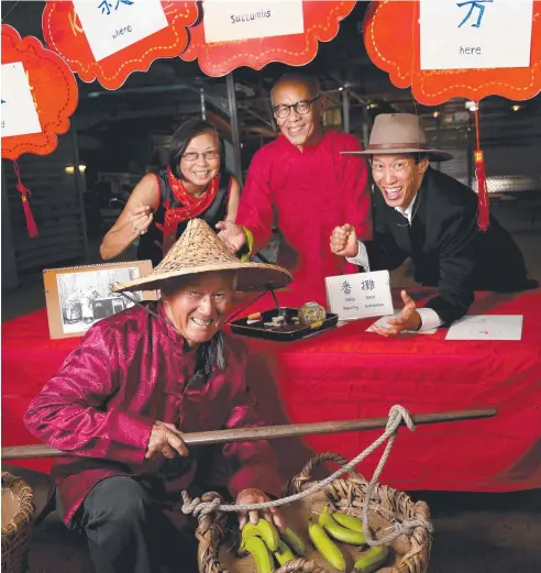  ?? Picture: ANNA ROGERS ?? LOTS TO SEE: CADCAI members Henry Wah Day, Mary Low, Jacky Tam and Trevor Garvey at Rusty's Markets which is one stop on the Chinese history walking tours which begin tomorrow.