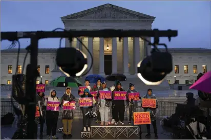  ?? PATRICK SEMANSKY — THE ASSOCIATED PRESS ?? Student debt relief advocates gather outside the Supreme Court on Capitol Hill in Washington on Monday.